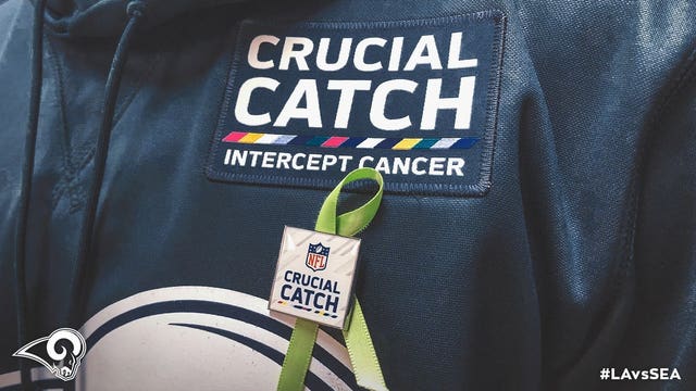 Rams wearing green ribbons in support of Paul Allen's cancer battle