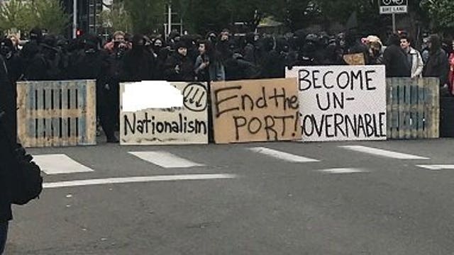 Nine officers injured, 9 protesters arrested in Olympia May Day riot