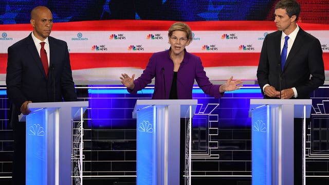 Democrats clash in 2020's opening debate, aiming at Trump