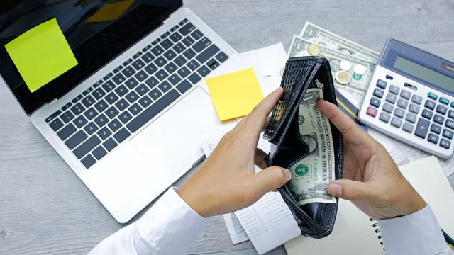 A record 6.6 million Americans seek unemployment aid as layoffs mount