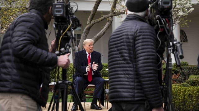 Trump hoping to see US economy reopened by Easter amid virus