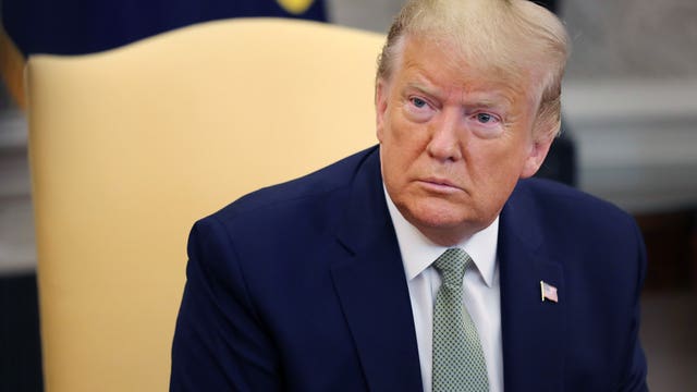 Trump invokes act to marshal private sector against virus