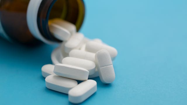 Cops say man tipped server with Valium pill