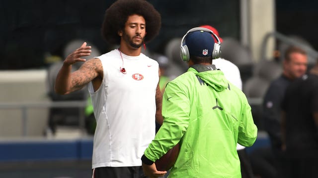 With Kaepernick in town, Seahawks continue show of unity during anthem