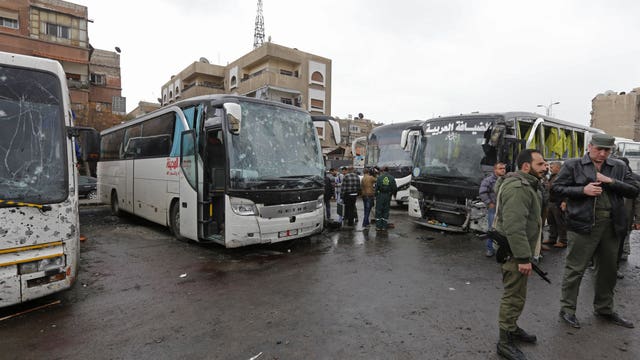 Twin blasts kill 40 near religious sites in Syria's capital