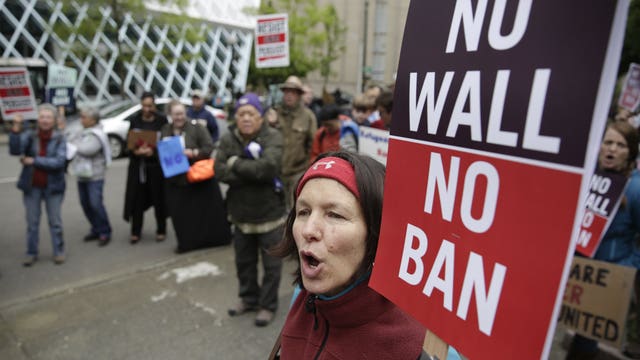 Temporary OK for travel ban puts focus on Wednesday hearing