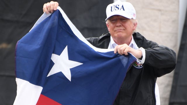 Trump offers Texans in-person reassurances on storm recovery