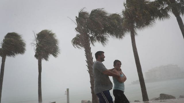 Despite warnings, some residents insist on riding out Irma at home