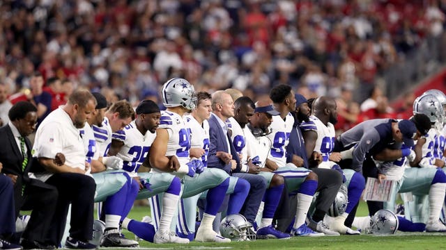 Dallas Cowboys owner Jerry Jones joins team to kneel before anthem