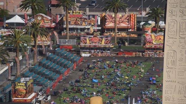 At somber hall, people retrieve items lost in Vegas shooting