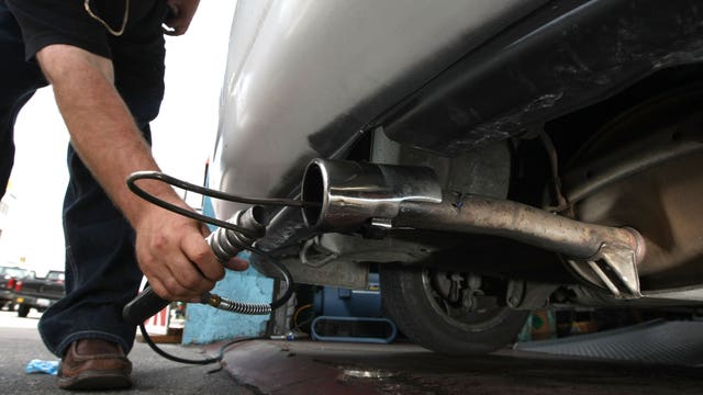 Washington, 16 states sue over plan to scrap car emission standards