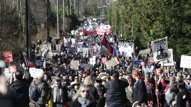 Thousands march to protest Canada pipeline expansion project