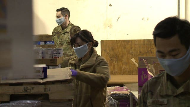 'It's very surreal': Guardsmen arrive to help local food banks amid coronavirus crisis