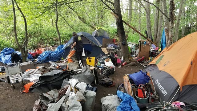 Puyallup sued for illegally trashing belongings during homeless camp sweeps