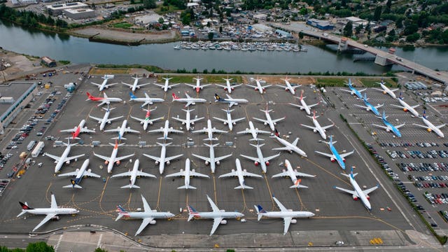 Back to work for some Boeing employees as report threatens workforce cuts