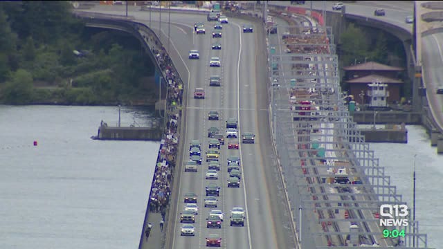 Seahawks wives lead a walk across I-90 bridge in support of Black Lives Matter movement