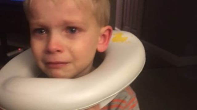 4-year-old gets toilet seat stuck on his head