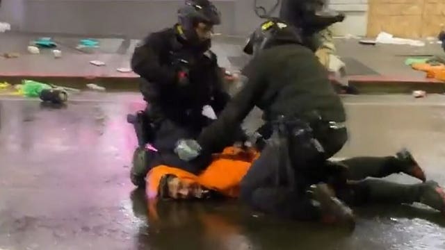 Seattle cop removes fellow officer’s knee from neck of man detained during riots, video shows