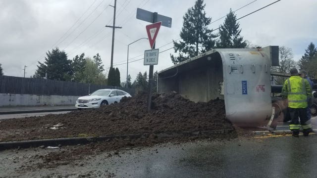 Semi-truck carrying manure overturns in Lacey