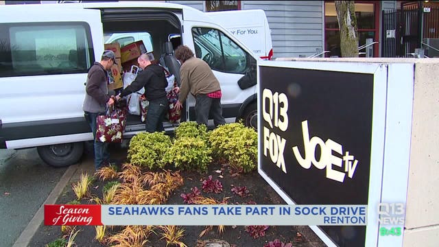 Kenmore man donates more than 7,900 pairs of socks to Q13 Season of Giving Sock Drive