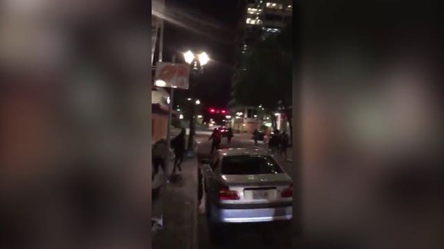 Three hurt, one arrested after car plows into Portland protesters