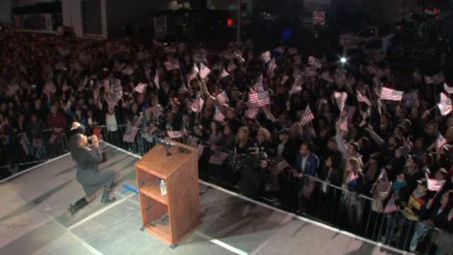 Singer at Clinton election event takes knee during national anthem