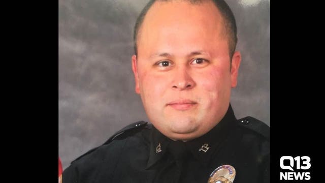Tacoma police identify officer killed in the line of duty as Reginald 'Jake' Gutierrez