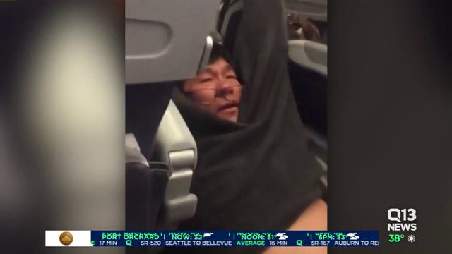 Family of man dragged off United flight says he is in hospital receiving treatment for injuries