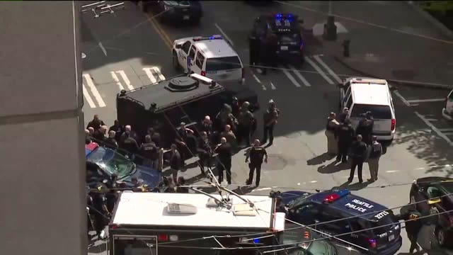3 Seattle police officers shot, wounded after robbery call; 1 suspect killed, 2 others in custody