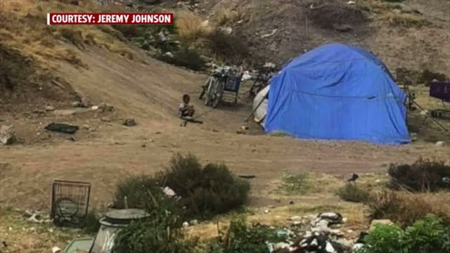 Photo of homeless father, son inspires help from strangers