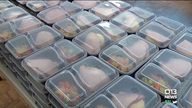 Dozens of Everett volunteers help bring a Thanksgiving feast to all