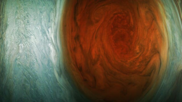 Spacecraft reveals beauty of solar system's biggest storm