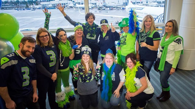 12s arrive in Charlotte aboard the 'Russell Wilson Carolina Airlift'