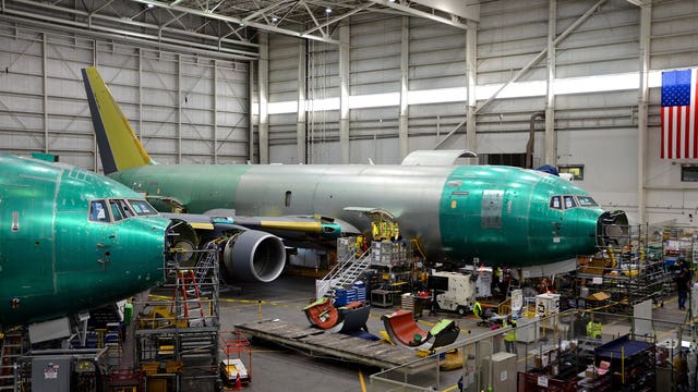 Boeing beats 2Q profit forecasts, raises full-year outlook
