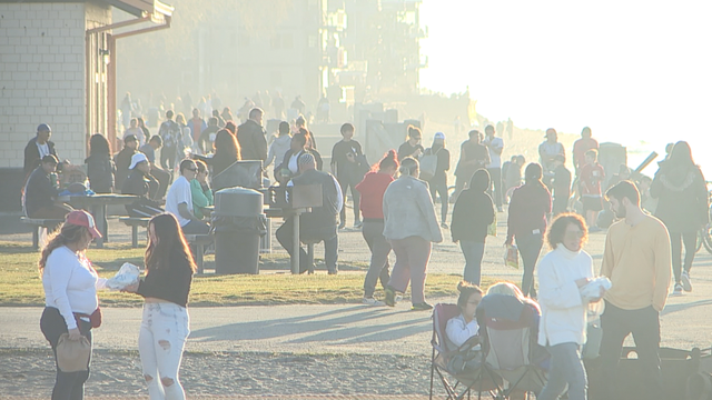 Despite statewide restrictions, many flock to Alki Beach during coronavirus pandemic