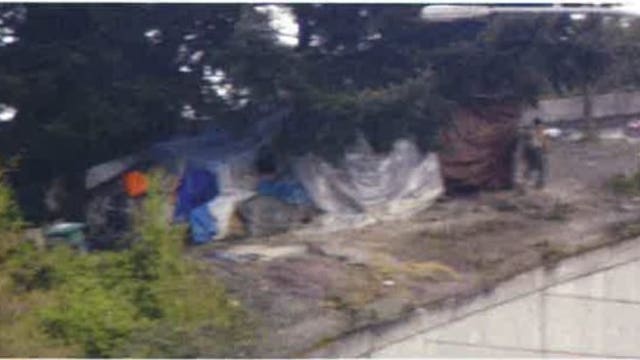 A homeless tent? No, Seattle police seize cache of weapons at suspected drug-selling site