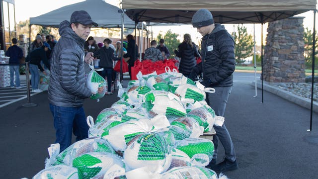 Families come together in annual turkey giveaway