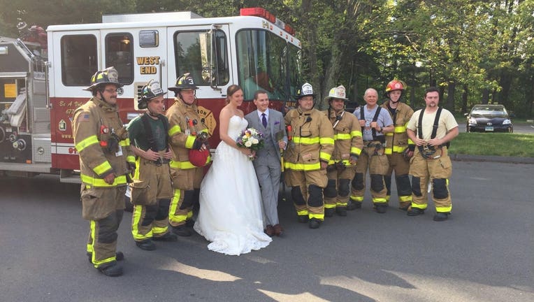 Firefighters save the day ... by taking newlyweds to their reception