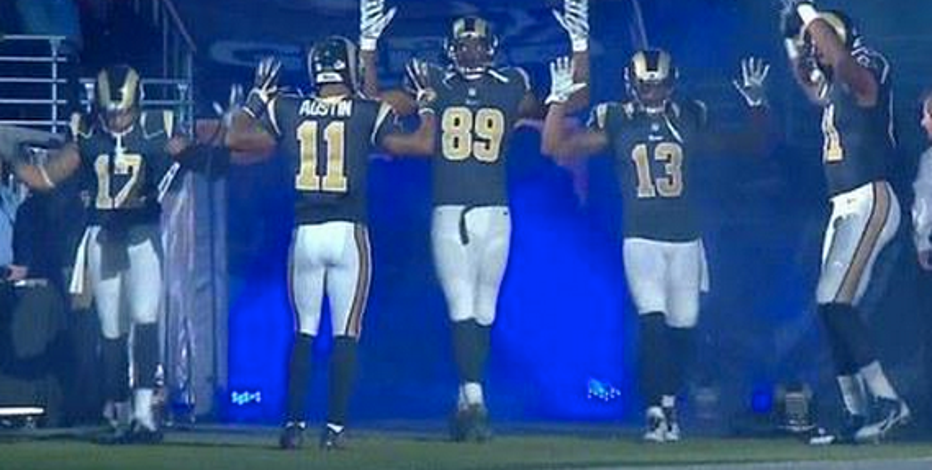 Black St. Louis police officers: 'Hands up' gesture by Rams