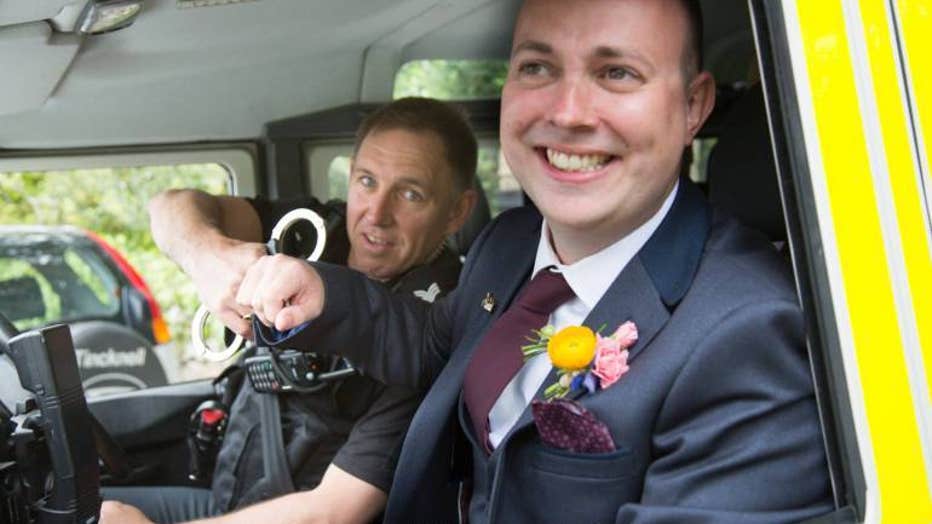 Photos of groom being 'arrested' at his wedding go viral on Facebook