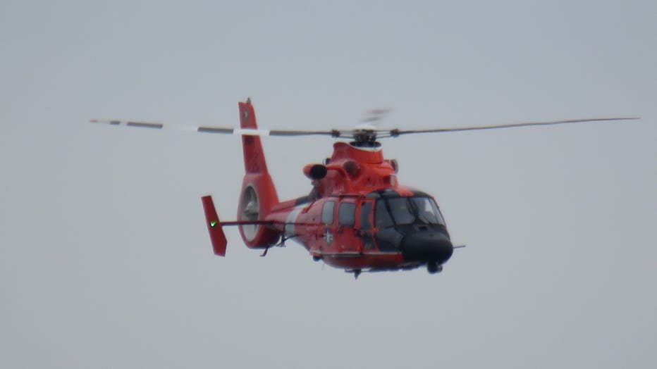 FILE: USCG helicopter conducts a search and rescue mission in on June 29, 2020