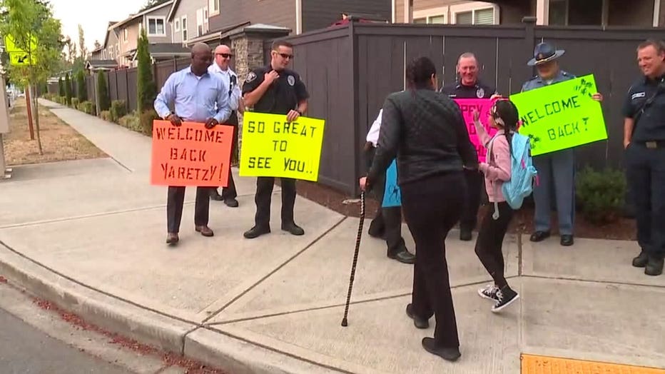 Renton girl, police firefighters