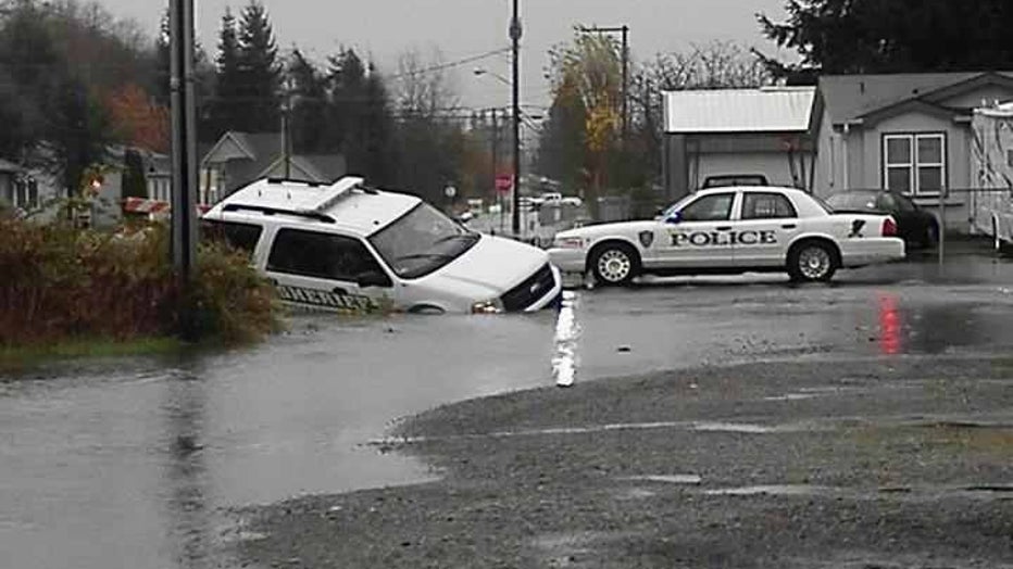 sheriff's car in storm