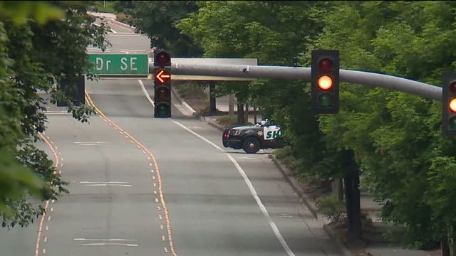 Police in Bellevue search for armed and dangerous shooting suspect