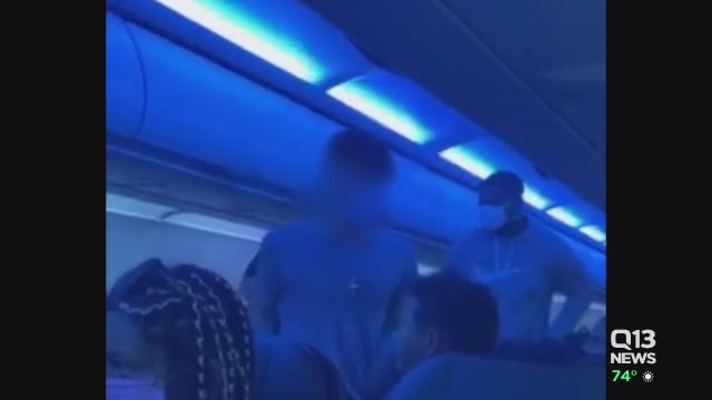 Police: Man arrested over threatening others on flight