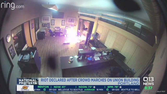 Two Portland police officers hurt after protesters set fires, use mortar