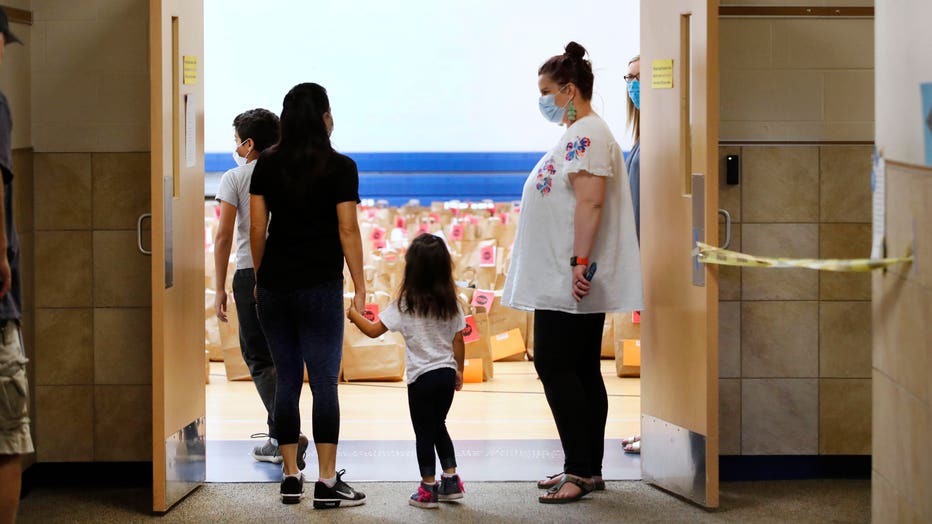 Students Pick Up Personal Belongings As Teachers Clean Out Classrooms At End Of Pandemic-Impacted School Year