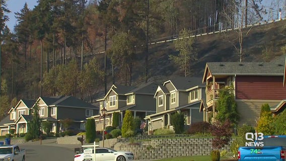 Families surprised to see homes standing after hundreds of acres burned