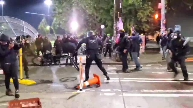 Seattle officer who ran over man's head with bicycle facing criminal probe