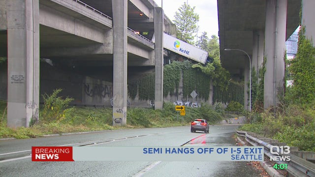 Crews remove semi-truck trailer hanging off I-5 exit; express lanes back open